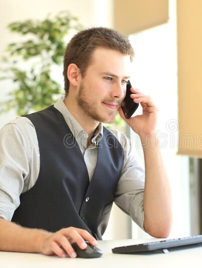 businessman-calling-phone-using-computer-to-customer-service-desktop-office-window-background-80071367